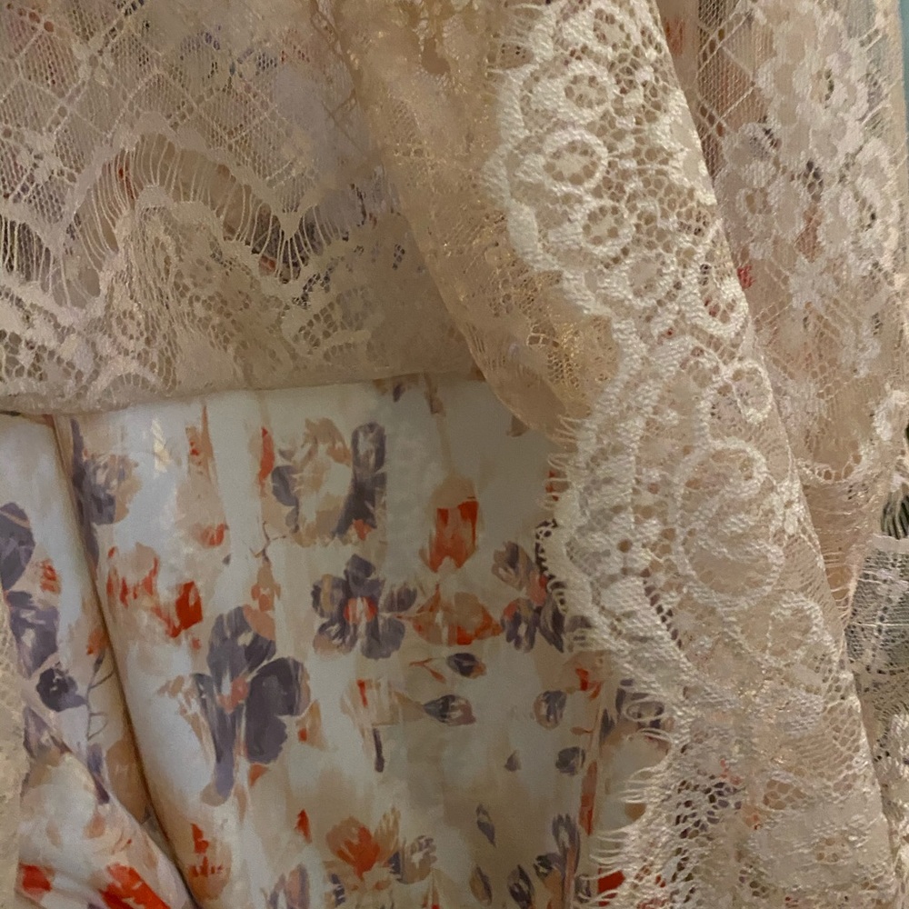 Dressy tank. Great 4 under a suit jacket or alone.